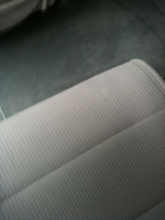 Repaired fabric seat