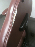 Damaged leather desk chair