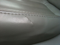 Torn leather seat